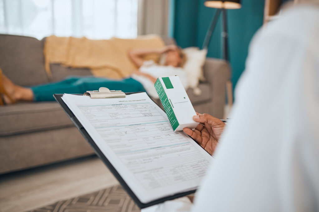 Medication, mental health and healthcare insurance paperwork in a psychology clinic session. 